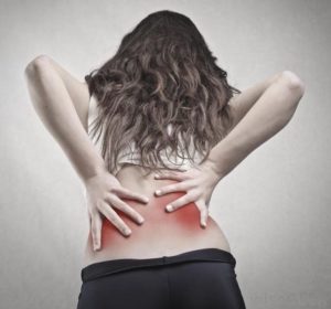 A Woman Experiencing Sciatica Pain