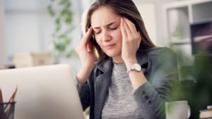 Women Suffering from Headache Pain