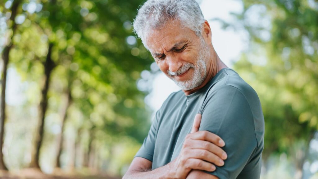 Man Experiencing Shoulder Pain In Bellevue, NE